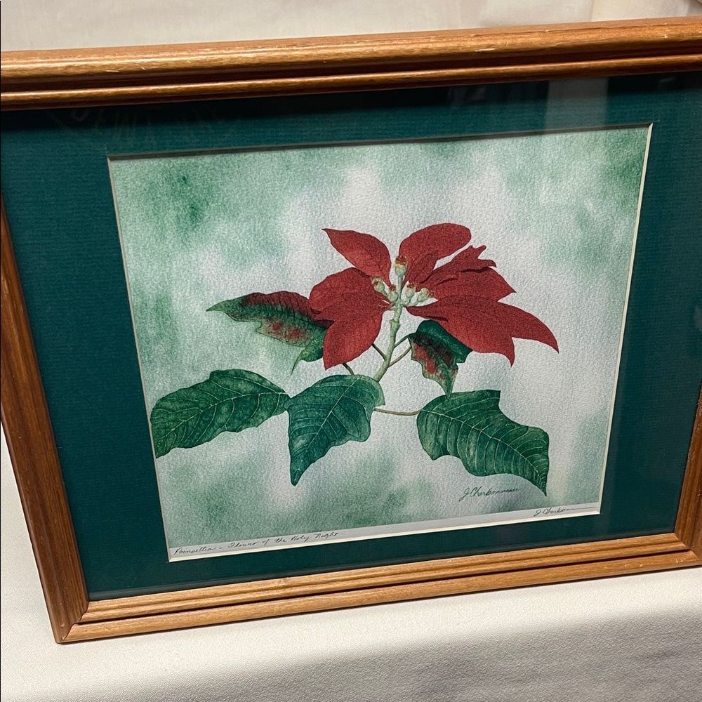 Watercolour “Poinsettia - Flower of The Holy Night” signed J Charbonneau.